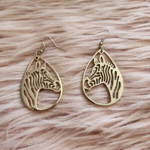 Zebra teardrop cutout silhouette gold tone earrings